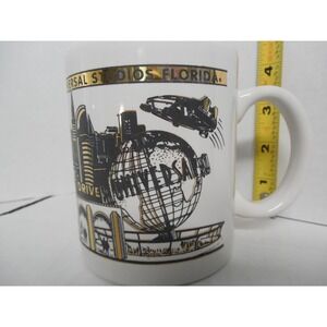 Universal Studios Florida  Coffee Mug  White Gold Souvenir Amusement Park 10 oz
